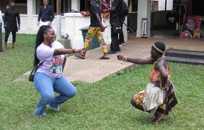 SC State’s Dominique Rolle learns a traditional Ashanti dance in Ghana.